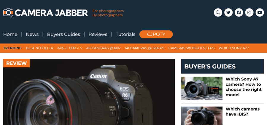 Camera Jabber homepage design with tagline "For photographers, by photographers", main and trending menus, and both the most recent review and recent "Buyer's Guides" listings.