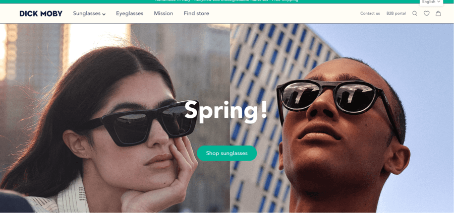 Dick Moby homepage design with the headline "Spring!" and a photo on one side displaying a woman in sunglasses + a photo on the other side displaying a man in sunglasses.