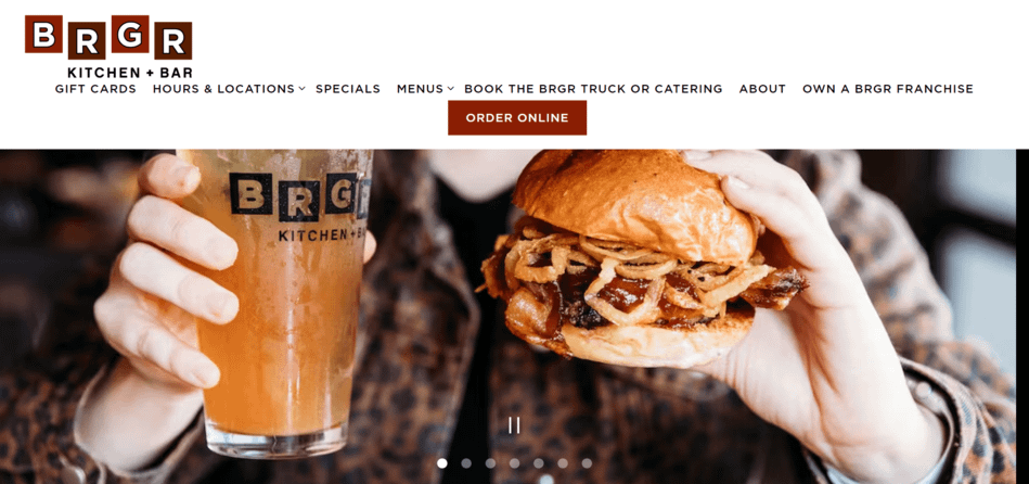 BRGR kichen homepage hero section image of a burger and drink.
