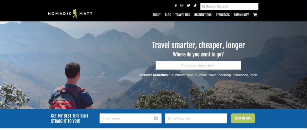 Nomadic Matt homepage with large image of a person facing mountains and "Travel smarter, cheaper, longer" headline.