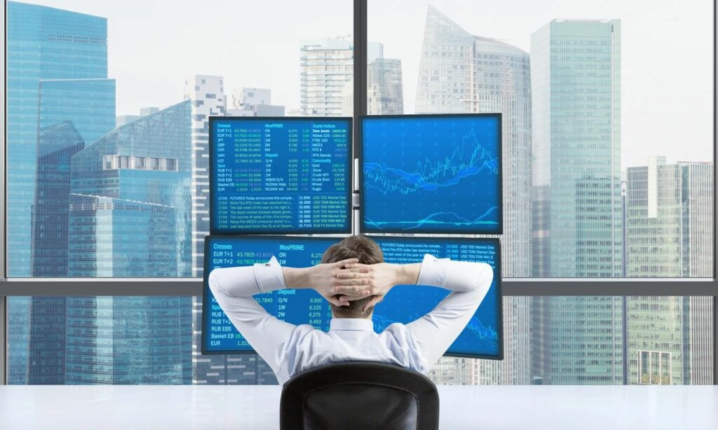 A man looking at stock market charts 