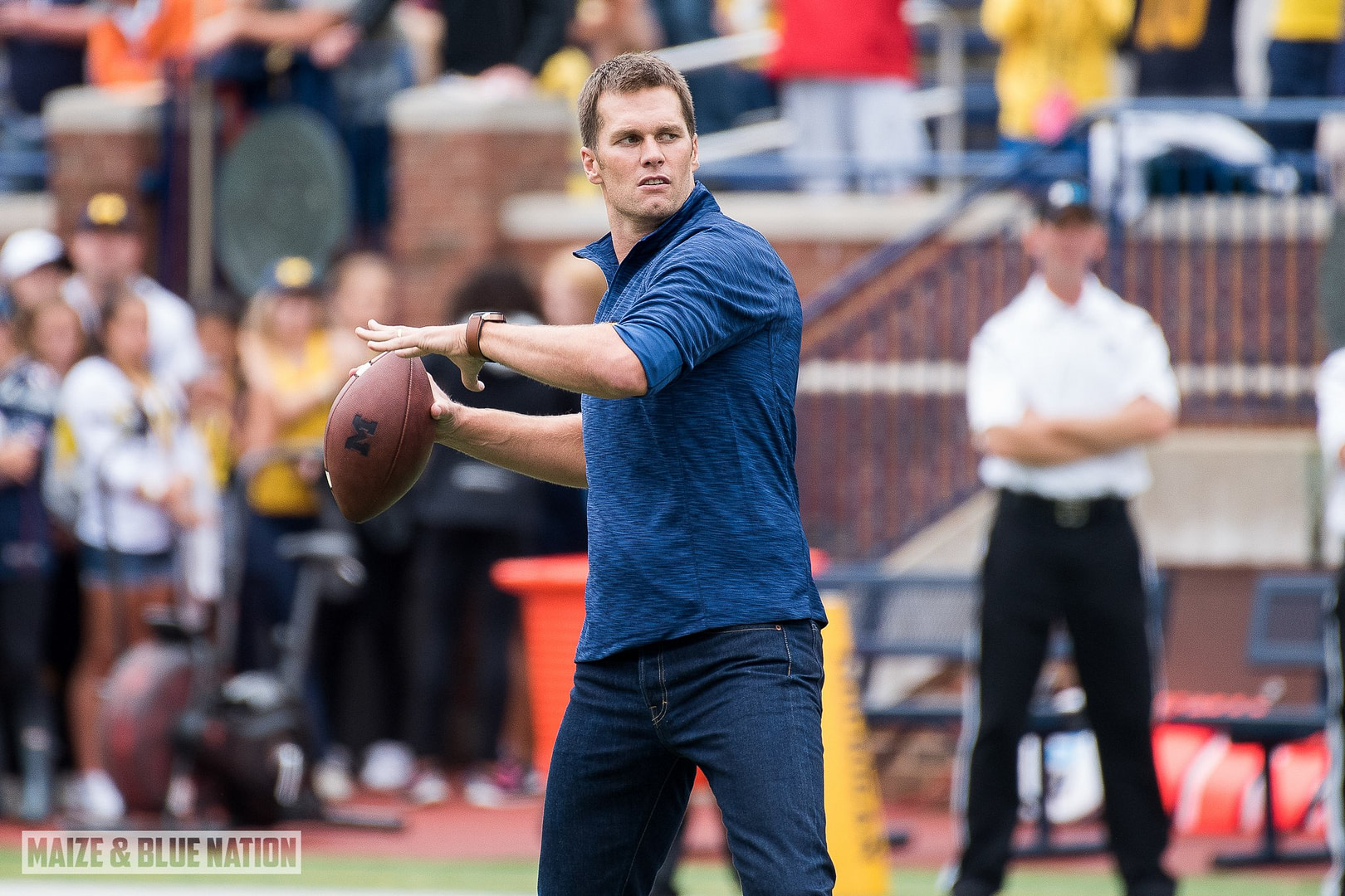 Tom Brady plays catch with Head Coach Jim Harbaugh  before Michigan's 45-28 victory over Colorado on September 17, 2016. (James Coller/Maize and Blue Nation)