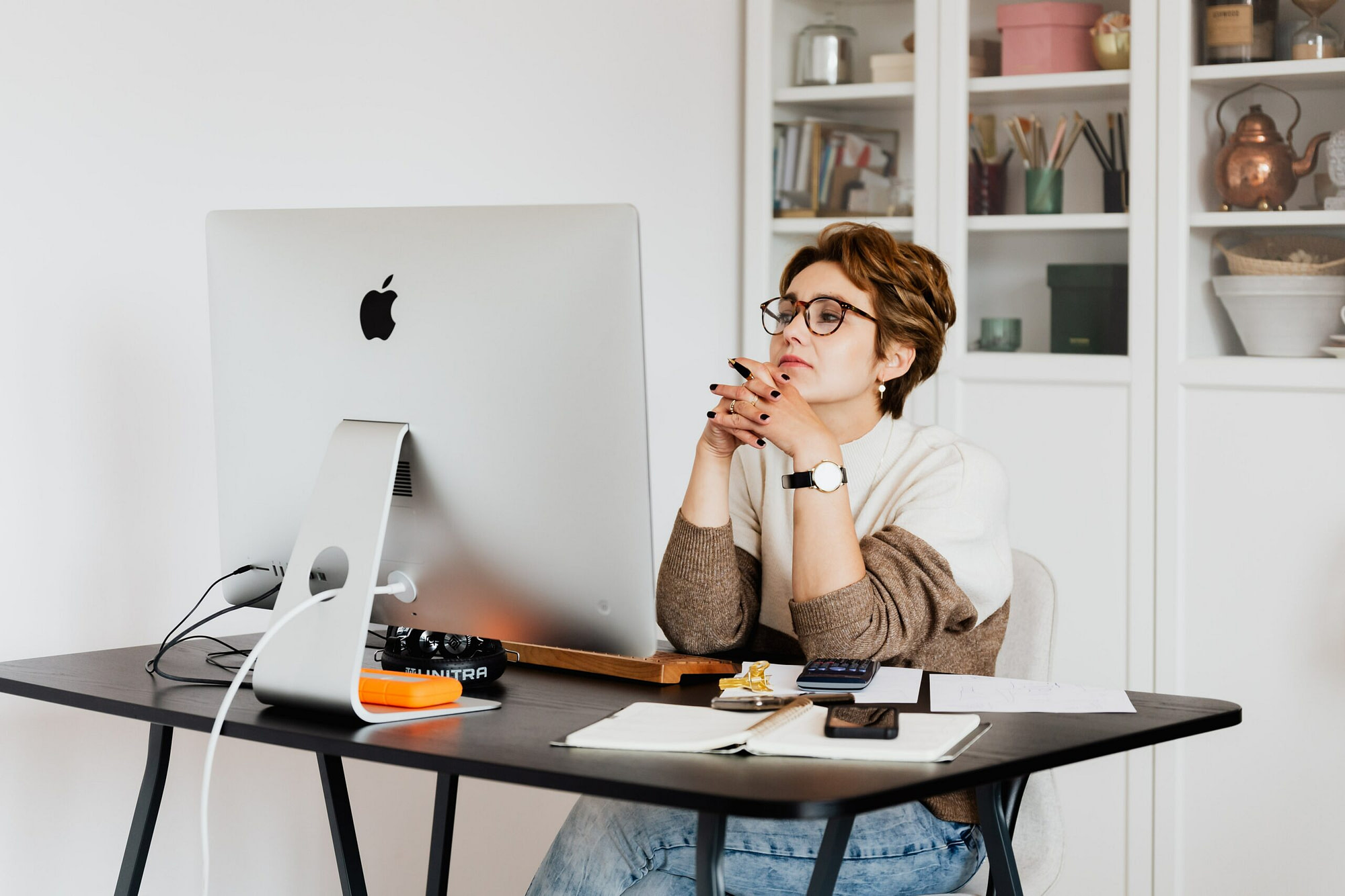 Woman sitting in front of the computer